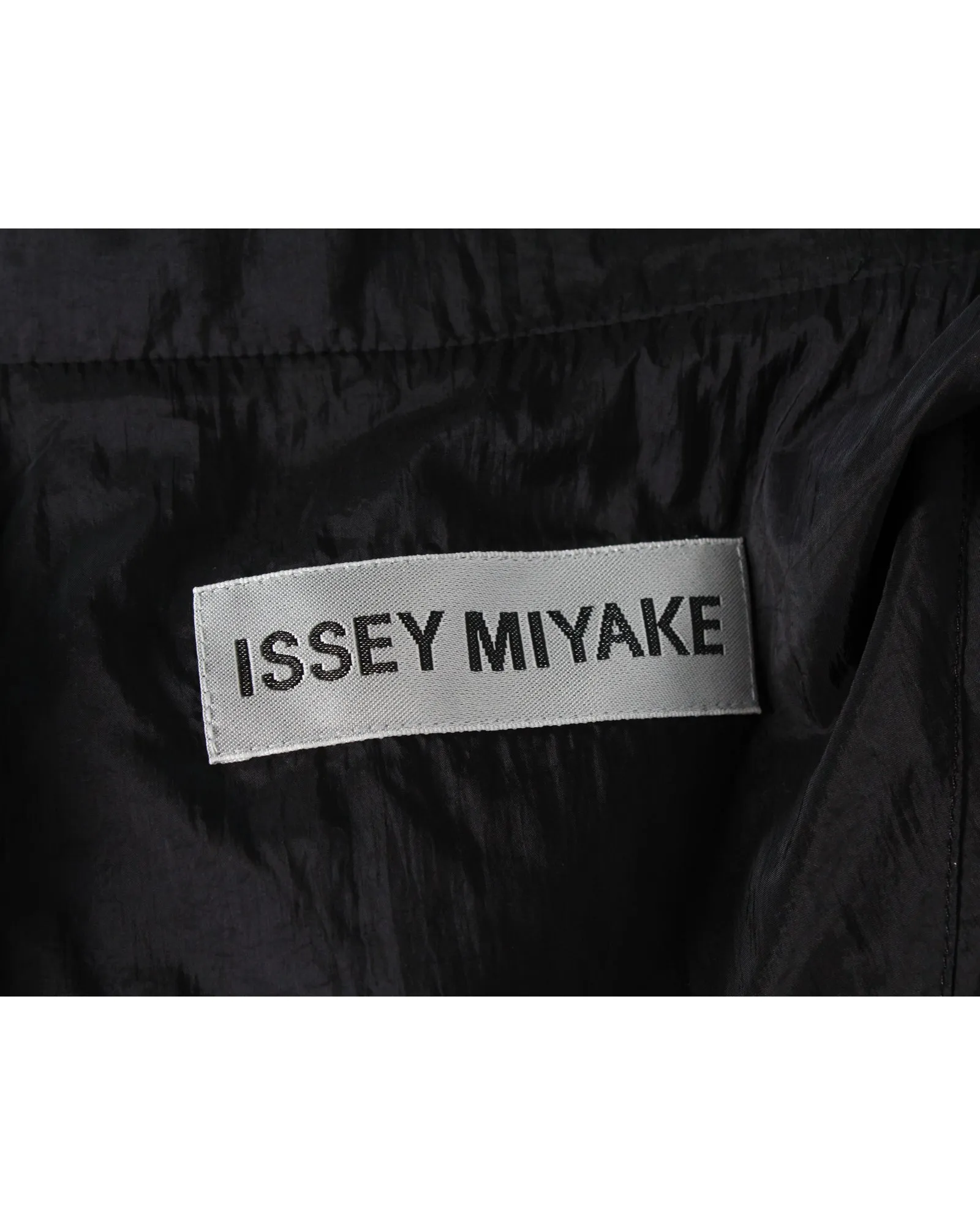 Issey Miyake Travel Raincoat in Black Nylon